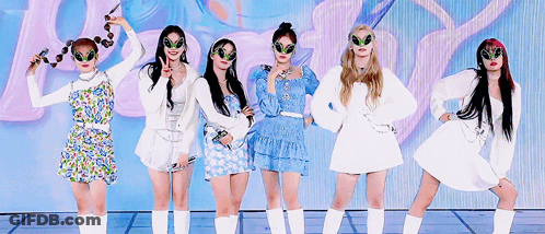 A Group Of Young Women Wearing Alien Glasses Are Standing Next To Each Other . GIF