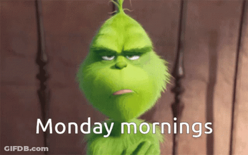 A Grumpy Grinch Says Monday Mornings In White Letters GIF