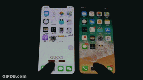 A Gucci Phone Is Next To An Iphone GIF