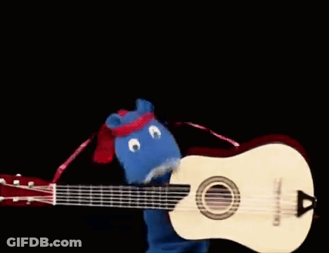 A Guitar Is Being Held By A Blue And Red Sock GIF