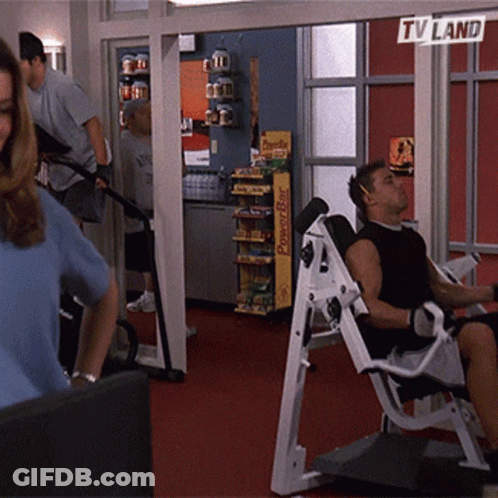 A Gym With A Sign That Says Tv Land GIF
