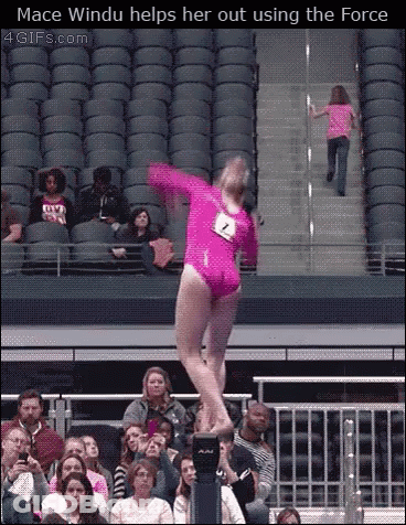 A Gymnast In A Pink Leotard With The Number 7 On Her Back GIF
