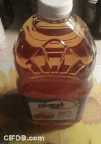 A Half Gallon Bottle Of Iowa Maple Syrup GIF