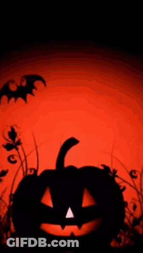 A Halloween Background With A Pumpkin And Bats Flying In The Sky . GIF