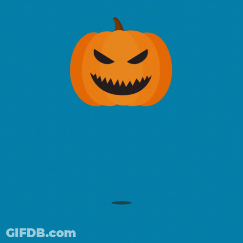 A Halloween Pumpkin With A Smiling Face And Black Teeth GIF