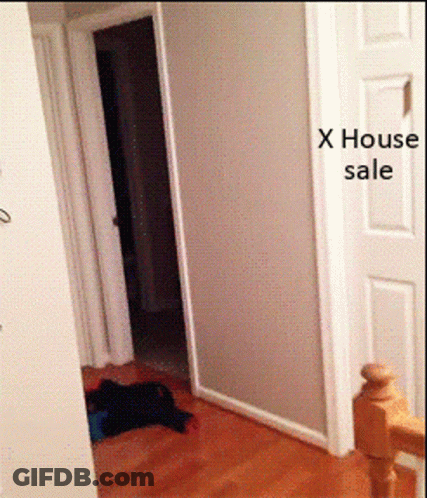 A Hallway With A Sign That Says X House Sale On It GIF