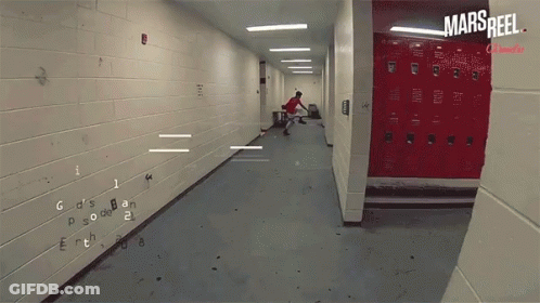A Hallway With Red Lockers And The Words Mars Reel On The Bottom GIF