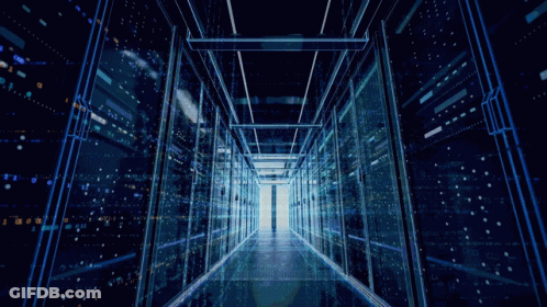 A Hallway With Rows Of Servers And A Light At The End Of It GIF
