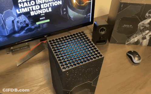 A Halo Infinite Limited Edition Bundle Sits On A Table GIF