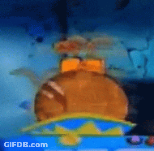 A Hamburger With A Crown On Top Of It Is Sitting On Top Of A Blue Table . GIF