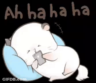 A Hamster Is Laying On A Pillow Holding A Cell Phone And Laughing . GIF