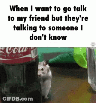 A Hamster Standing Next To A Coca Cola Bottle GIF