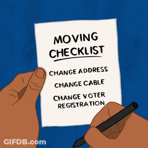 A Hand Holding A Piece Of Paper That Says Moving Checklist GIF