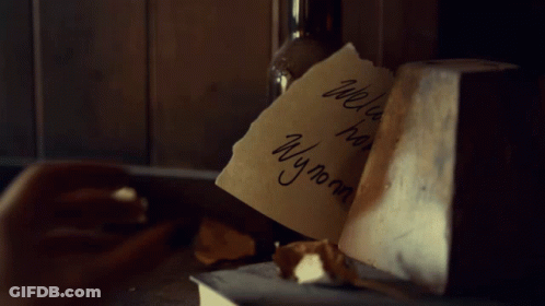 A Hand Holding A Piece Of Paper That Says Welcome Home Wyonna GIF