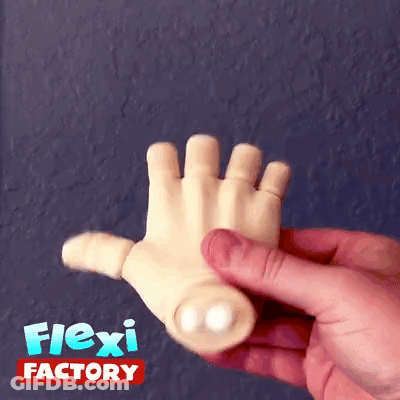 A Hand Is Being Held In Front Of A Flexi Factory Sign GIF
