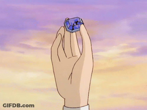 A Hand Is Holding A Blue Box With A Cross On It In Front Of A Cloudy Sky GIF