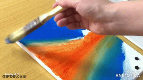 A Hand Is Holding A Brush Over A Piece Of Paper That Says ' Made In Animatica ' On It GIF