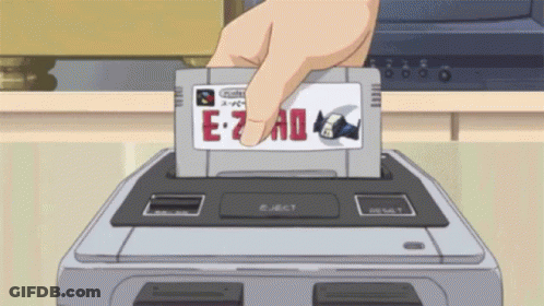 A Hand Is Holding A Cartridge That Says E-7 Ad GIF