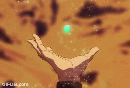 A Hand Is Holding A Glowing Sphere In It 'S Palm GIF