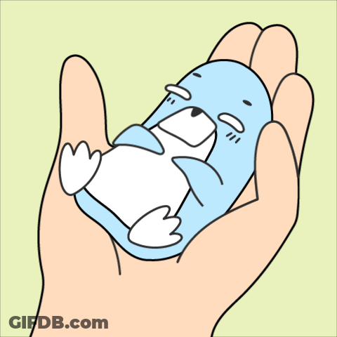 A Hand Is Holding A Small Blue And White Penguin GIF