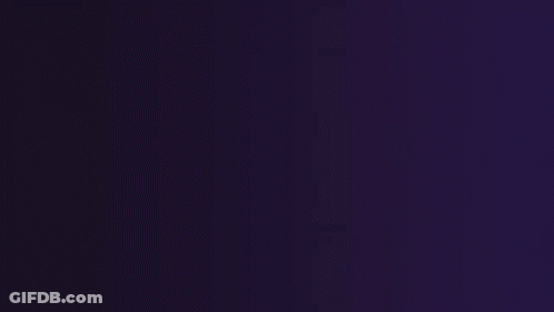 A Hand Is Holding A Tablet That Has The Word Mini On It GIF