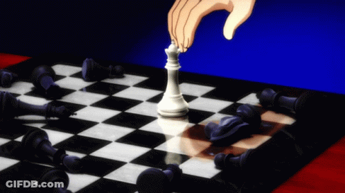 A Hand Is Playing A Game Of Chess With A White King On The Board GIF