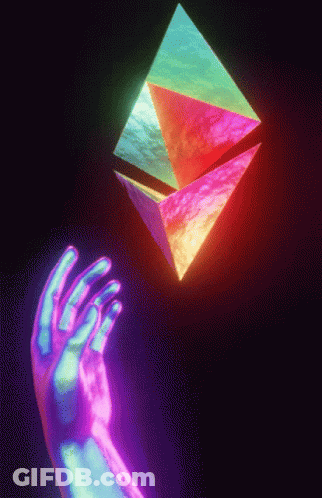 A Hand Is Reaching For A Rainbow Colored Object GIF