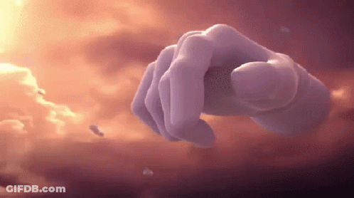 A Hand Is Reaching Out Towards A Cloudy Sky . GIF