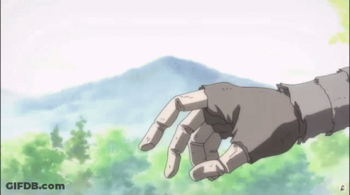 A Hand Is Reaching Out Towards A Mountain GIF
