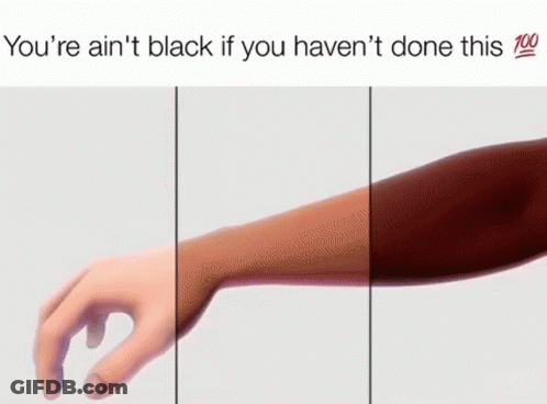 A Hand Is Touching A Person 'S Arm With A Tattoo On It . GIF
