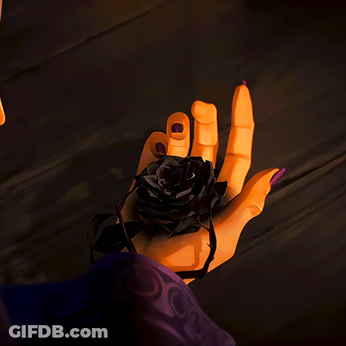 A Hand With Purple Nail Polish Is Holding A Dark Rose GIF