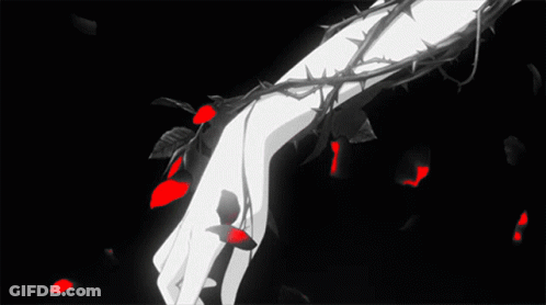 A Hand With Thorns And Red Petals On It GIF