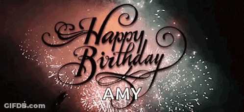 A Happy Birthday Amy Sign With Fireworks Behind It GIF