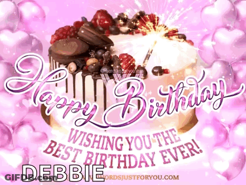 A Happy Birthday Card For Debbie With A Cake GIF