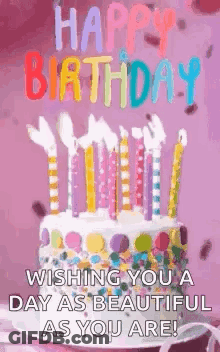 A Happy Birthday Greeting Card With A Cake And Candles On It . GIF