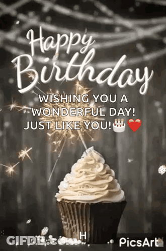 A Happy Birthday Greeting Card With A Cupcake And Sparklers . GIF