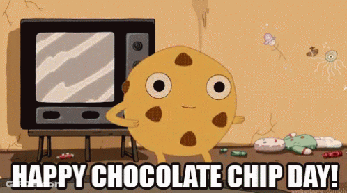 A Happy Chocolate Chip Day Cartoon With A Cookie Standing In Front Of A Television GIF