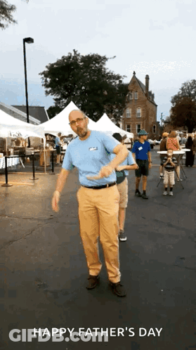 A Happy Father 'S Day Greeting With A Man In A Blue Shirt GIF