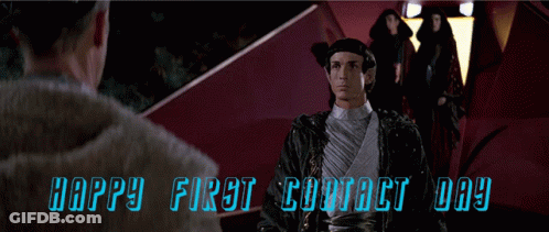 A Happy First Contact Day Greeting With A Man Waving GIF
