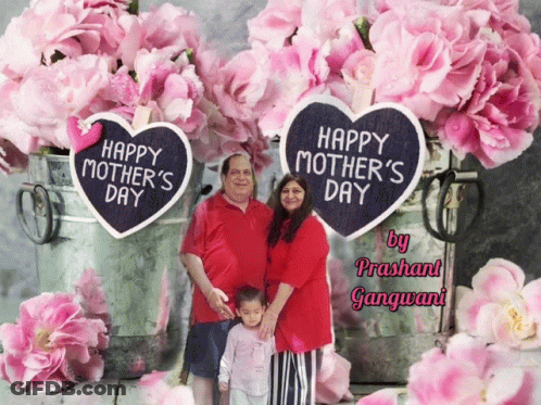 A Happy Mother 'S Day Greeting Card With A Family Standing In Front Of Pink Flowers GIF