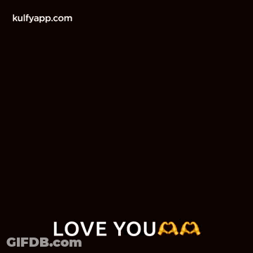A Happy New Year Greeting Card With A Heart Cut In Half And The Words `` Love You '' . GIF