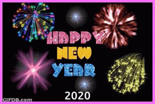 A Happy New Year Greeting Card With Fireworks Exploding In The Background . GIF