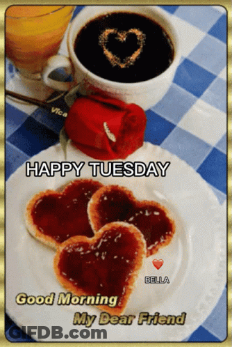 A Happy Tuesday Greeting With A Heart Shaped Cookie On A Plate GIF