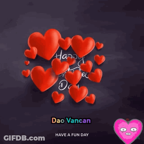 A Happy Valentine 'S Day Greeting With Red Hearts GIF