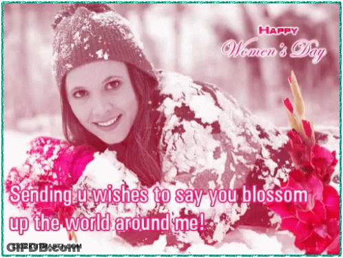 A Happy Women 'S Day Card With A Woman Laying In The Snow GIF
