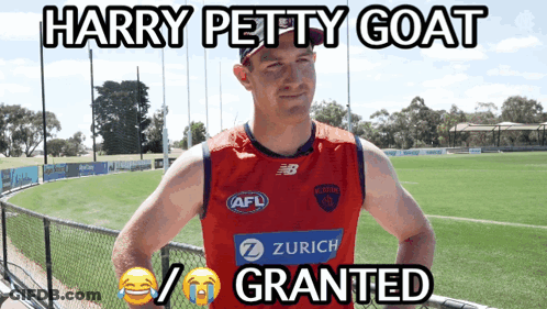 A Harry Petty Goat Poster With A Man Wearing A Red Jersey GIF