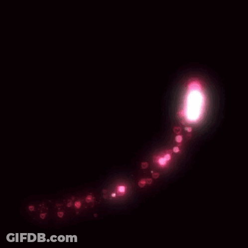 A Heart Made Of Pink Lights And Hearts On A Dark Background GIF