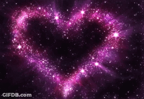 A Heart Made Of Purple And Pink Stars On A Dark Background GIF