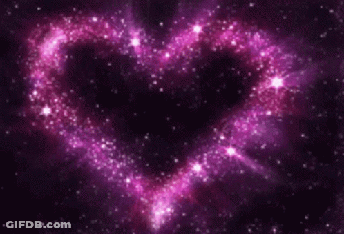 A Heart Made Out Of Purple Stars On A Dark Background GIF