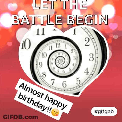 A Heart Shaped Clock Says Let The Battle Begin GIF